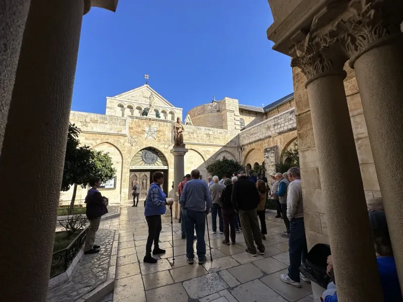 A tour group visits the Basilica of the Annunciation in Nazareth, Israel.