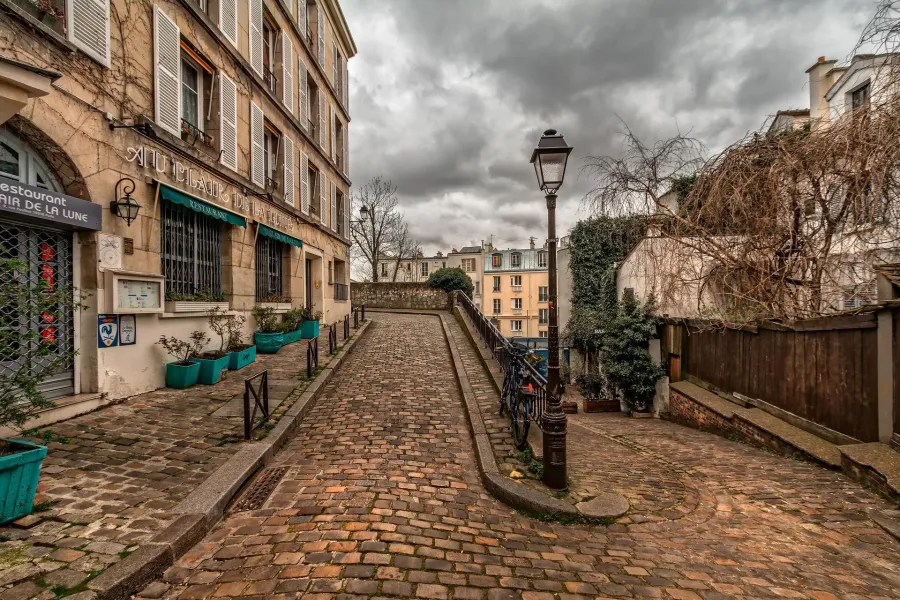 Charming cobblestone street in Paris, France.