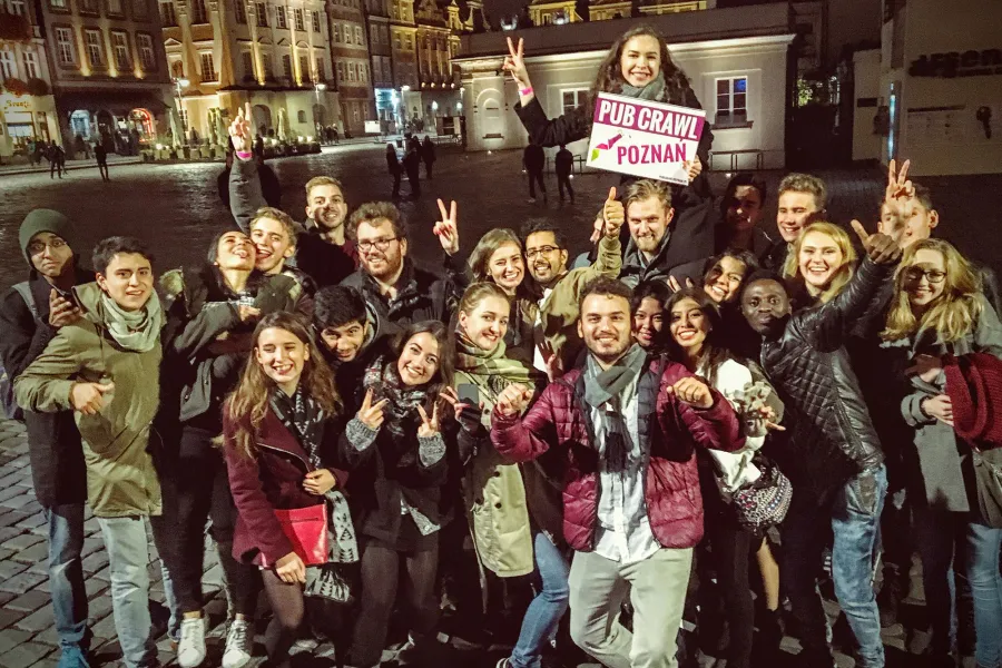 Happy tourists on a Poznan pub crawl.