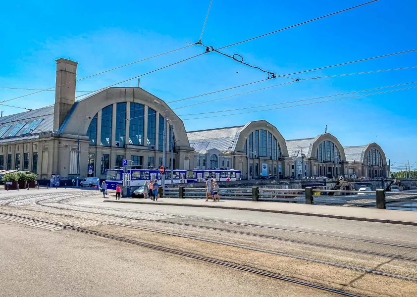 Tourists exploring the Riga Central Market in Latvia.