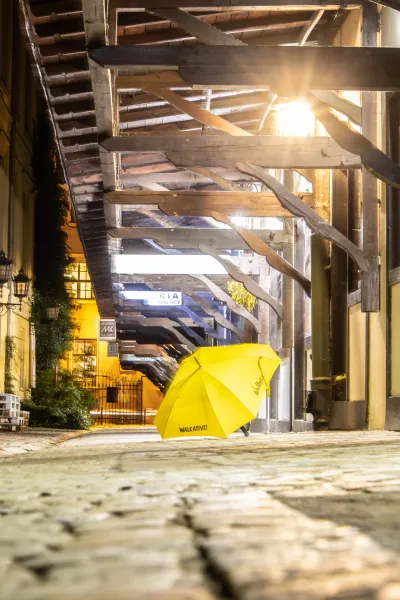 Yellow umbrella with WALKATIVE! in Wroclaw, Germany.