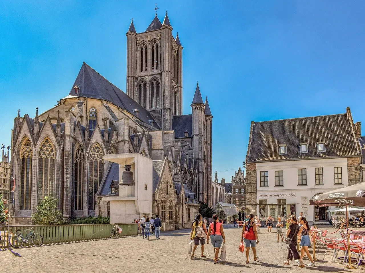 Tourists exploring the historic center of Ghent, Belgium, on a Legends of Ghent Tour.