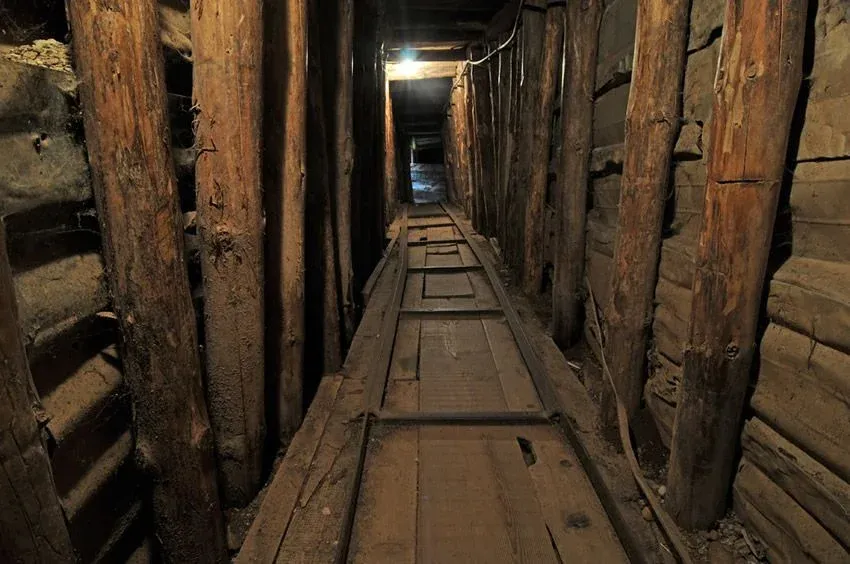 Interior of a dark, historical tunnel in Sarajevo.