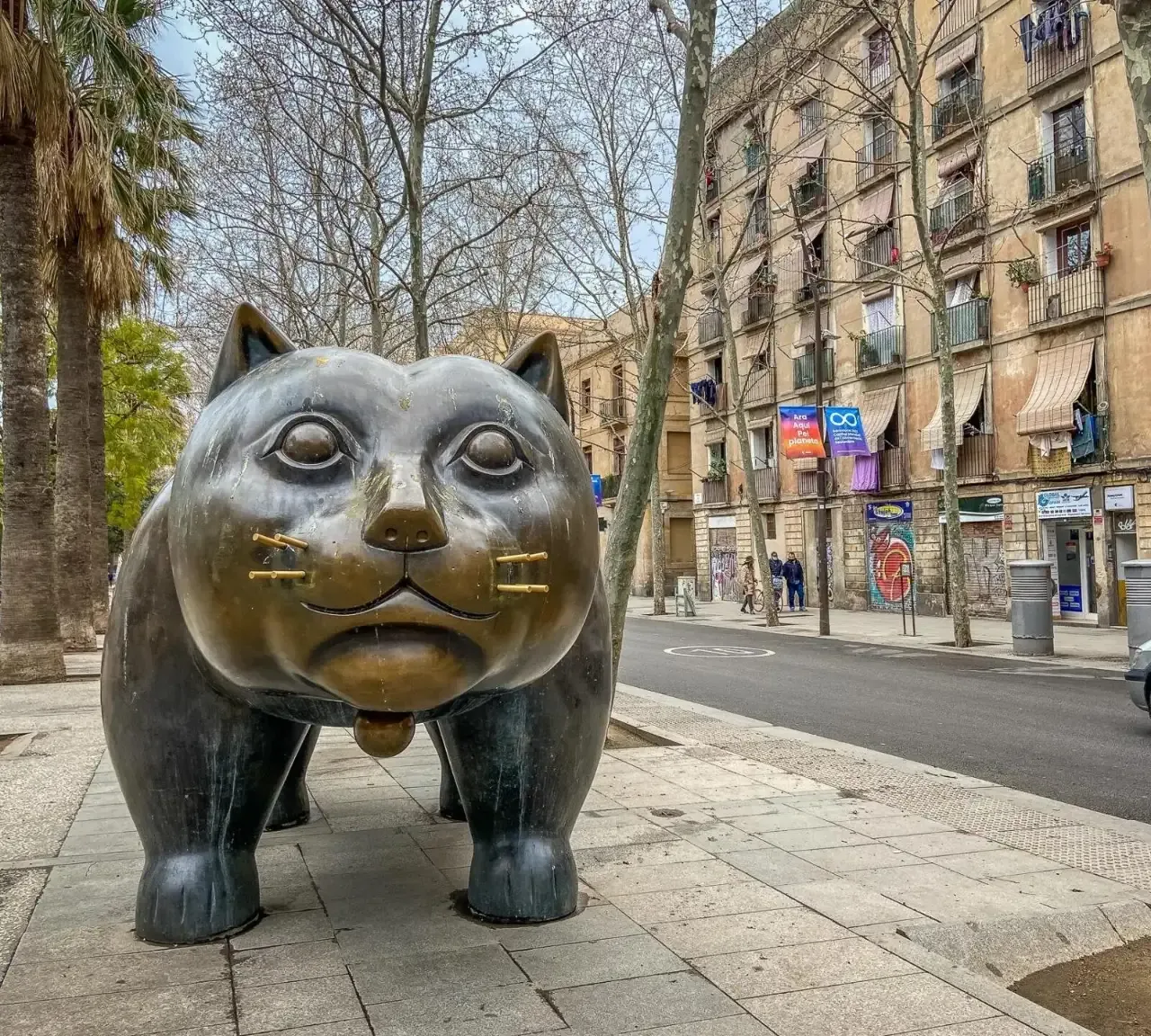 Bronze cat sculpture in El Raval, Barcelona.