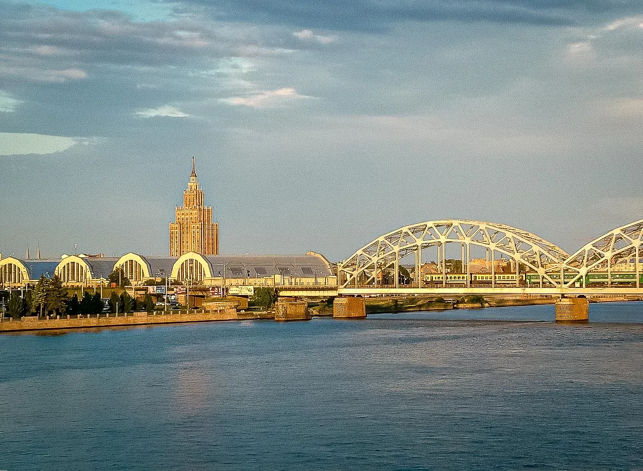 Riga skyline: Academy of Sciences, Central Market, and Railway Bridge.