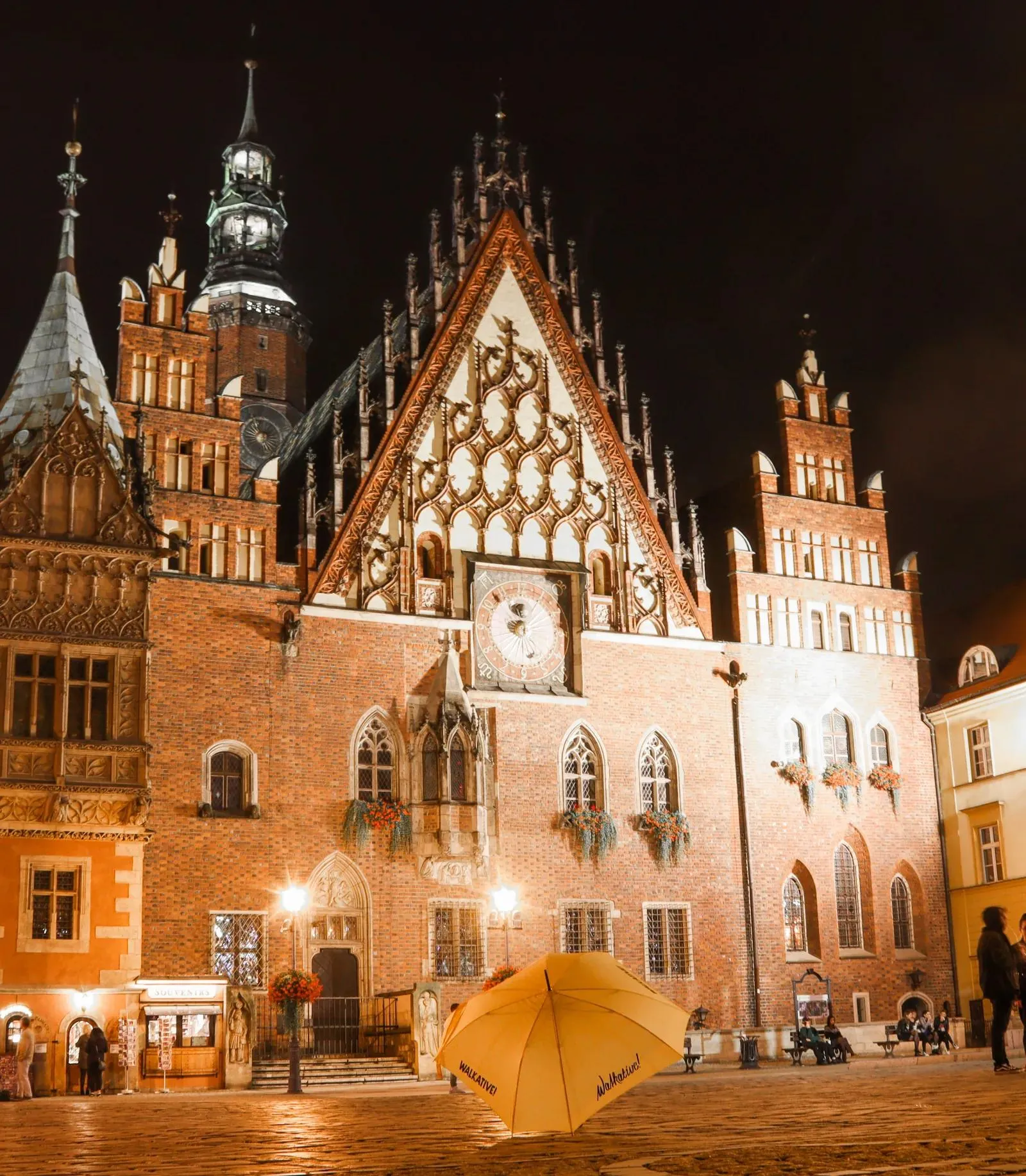 Night view of Wrocław's Old Town Hall, a stunning example of Gothic architecture.
